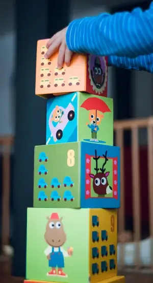 Child stacking boxes